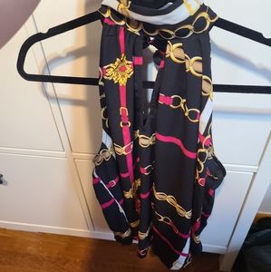 Medium black, pink, gold and white blouse with side sitting tie